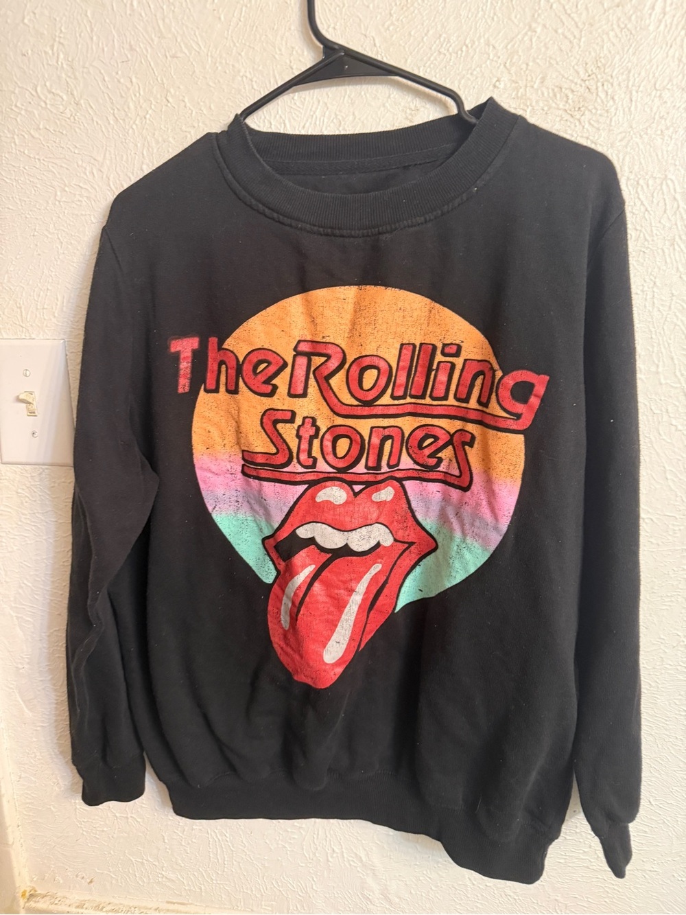 the Rolling Stones Black Sweatshirt with Multicolor Sunset and Red Tongue